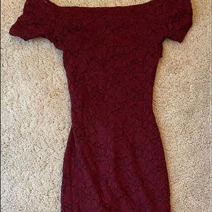 maroon dress with open back lace type of fabric